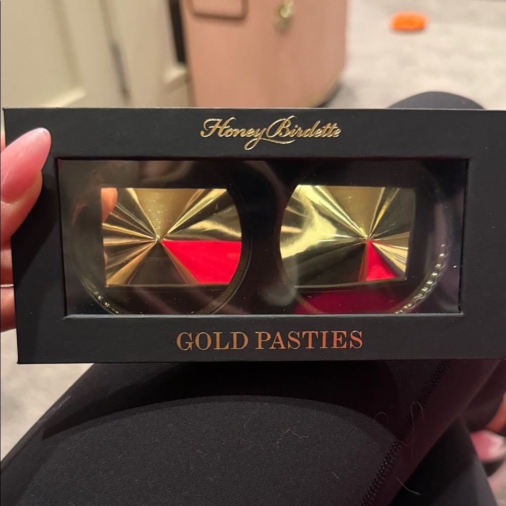 Honey Brigette shiny Gold pasties. NWT